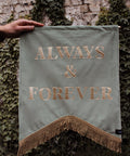 Velvet wedding banner in sage green with "always and forever" gold text and gold fringing