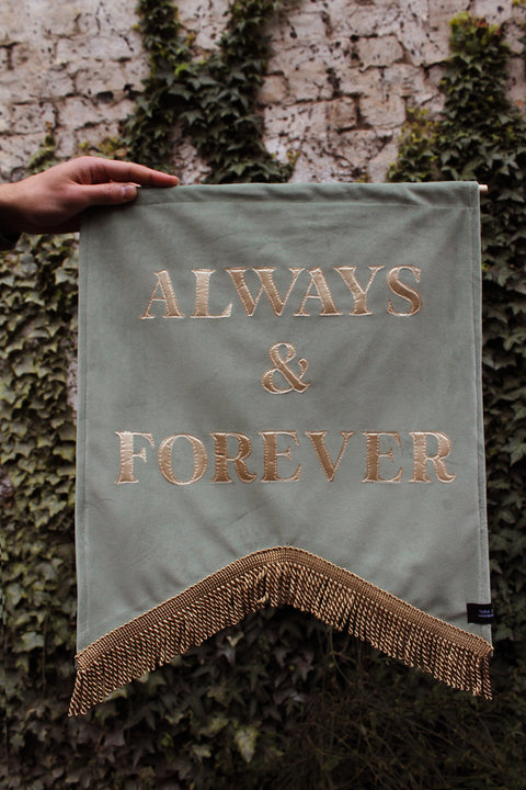 Velvet wedding banner in sage green with "always and forever" gold text and gold fringing