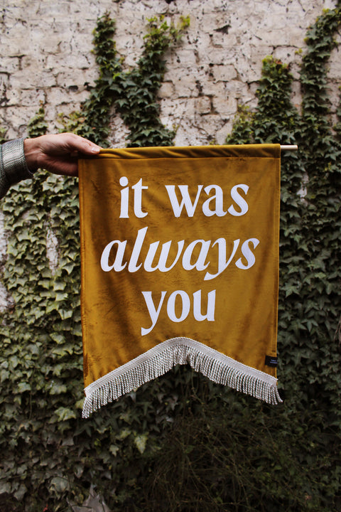 Velvet wedding banner in gold with "it was always you" text and silver fringing